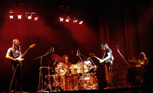 Pink Floyd performing live, L to R: Gilmour, Mason, Waters, Right